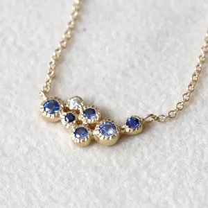 7 bezel cluster necklace