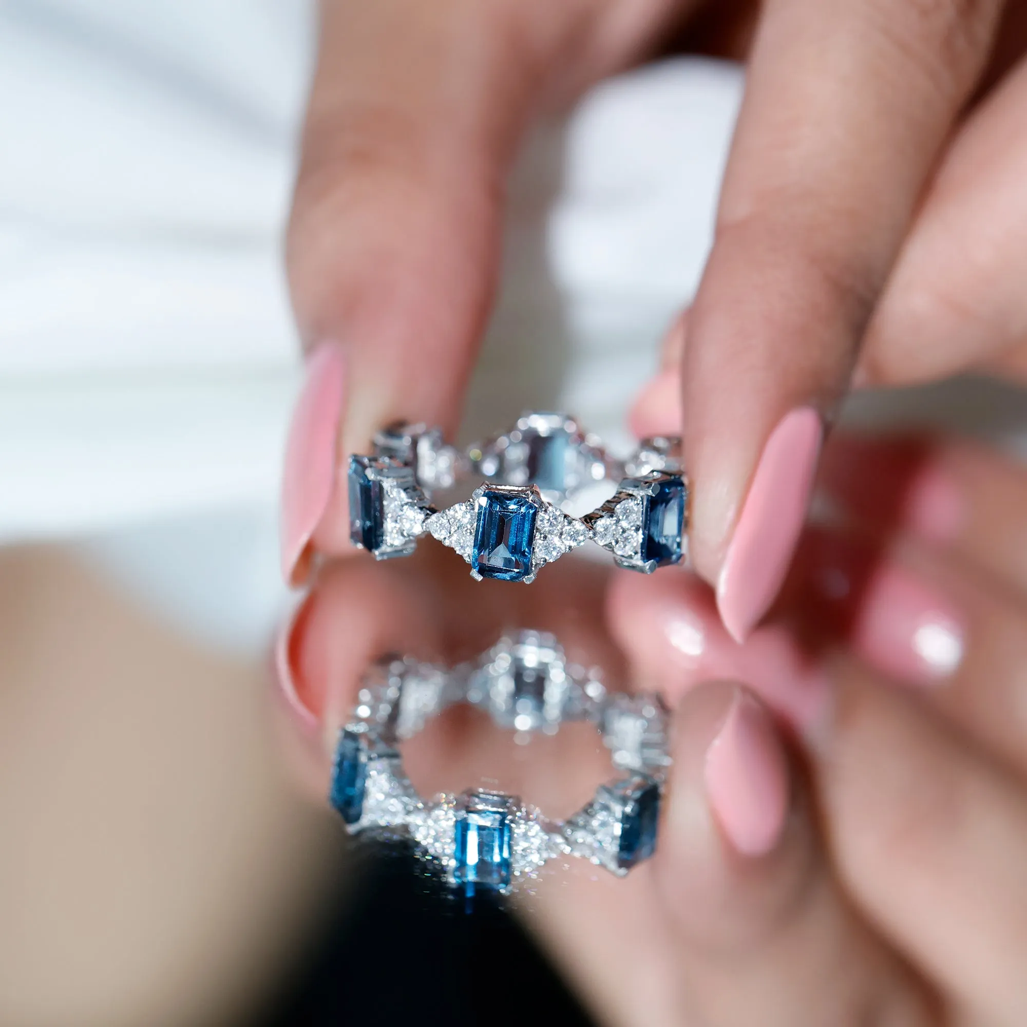 London Blue Topaz and Moissanite Eternity Ring